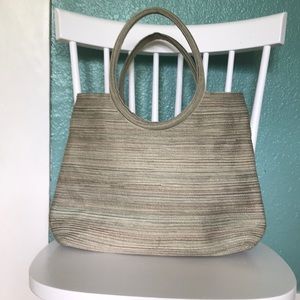 Need a beach bag? Cute green straw lined bag!